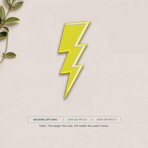 May include: An embroidered lightning bolt patch in bright yellow with a white border. The patch features a textured stitch pattern throughout. Below the patch, text reads: BACKING OPTIONS: SEW ON PATCH or IRON ON PATCH. Note: The larger the size, the better the patch looks.