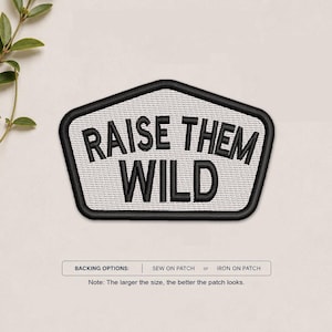 May include: A pentagonal embroidered patch with a white background and a thick black border. The patch features the black embroidered text RAISE THEM WILD. Below the patch, text reads BACKING OPTIONS: SEW ON PATCH or IRON ON PATCH.