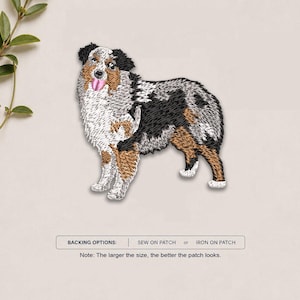 May include: An embroidered patch featuring a blue merle Australian Shepherd dog with black, white, and tan fur, standing with its tongue out. Below the dog, text reads: BACKING OPTIONS: SEW ON PATCH or IRON ON PATCH. Note: The larger the size, the better the patch looks.