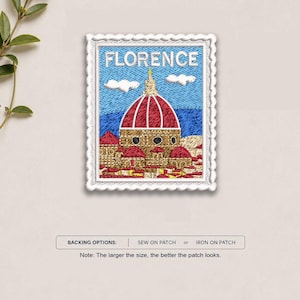 May include: A rectangular embroidered patch shaped like a postage stamp featuring the Florence Cathedral with a red dome against a blue sky with white clouds. The text FLORENCE is stitched in white at the top. Includes backing options text.
