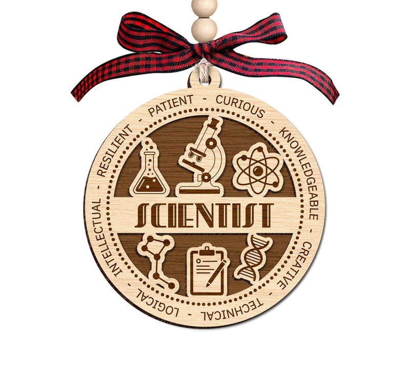 May include: A wooden scientist ornament with a red and black plaid ribbon. The ornament features the word "SCIENTIST" and science-related icons. The border includes words like "Patient", "Curious", "Knowledgeable", "Creative", "Technical", "Logical", "Intellectual", and "Resilient".