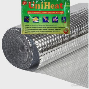 May include: A roll of silver, bubble-wrap-like material with a green and red packet labeled "UniHeat Multi-Purpose Jumbo Shipping Warmer." The packet lists uses for shipping live insects, reptiles, and flowers. The warmer provides a surface temperature of 100°F.