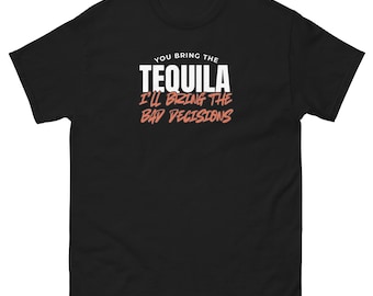 May include: Black t-shirt with the text "YOU BRING THE TEQUILA I'LL BRING THE BAD DECISIONS" in white and coral lettering. The shirt has short sleeves and a crew neck.