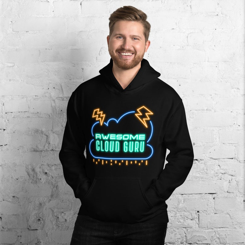 May include: Black hoodie featuring a neon green and orange cloud graphic with the text "Awesome Cloud Guru".