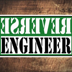 May include: Black and green sign with white text that reads "Reverse Engineer".