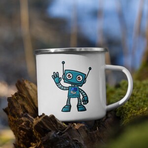 May include: White enamel mug with a blue robot illustration. The robot is waving and has red eyes. The text "#CAPTCHA" is on the robot's chest.