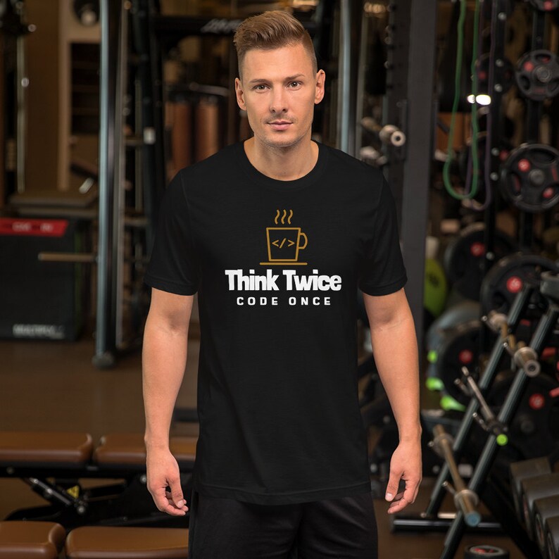 May include: Black t-shirt with a white graphic of a coffee cup with steam and the text "Think Twice Code Once".