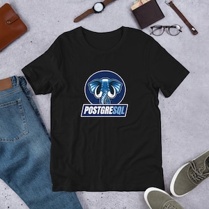 May include: Black t-shirt featuring a blue and white graphic of an elephant with the text "POSTGRESQL" underneath.