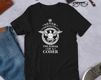 Nunca subestimes el poder de una camiseta unisex de manga corta Coder