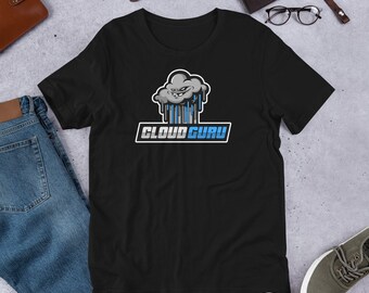 May include: Black t-shirt with a cartoon cloud graphic and the text "CLOUD GURU" in blue and white.