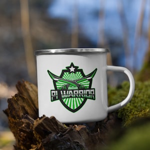 May include: White enamel mug with a green, black, and white logo that says "PI WARRIOR". The logo features a star, two swords, and a green and white striped shield.