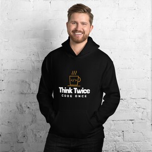 May include: Black hoodie with a white graphic of a coffee cup with steam and the text "Think Twice Code Once" in gold.