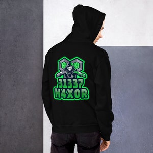 May include: Black hooded sweatshirt with a green graphic of a hooded figure with the text "31337 H4XOR" on the back.