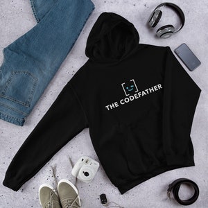 May include: Black hooded sweatshirt with a white graphic design that says "THE CODEFATHER" with a blue smiley face inside a square.