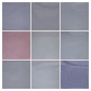 Könnte beinhalten: Neun Stoffmuster mit verschiedenen Mustern und Farben. Die obere Reihe zeigt dunkelblaue und weiße geometrische Designs. Die mittlere Reihe enthält einen rot-grau gestreiften Stoff. Die untere Reihe zeigt ein blau-weißes Karomuster.