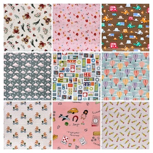 May include: Nine fabric swatches with diverse patterns. Designs include teddy bears, flowers, cars, clouds, machinery, hot air balloons, bears on bicycles, and miscellaneous illustrations with text. Colours vary across the swatches.
