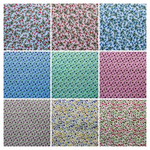 May include: Nine fabric swatches featuring a variety of floral patterns. The designs include small flowers, leaves, and vines in a range of colours and arrangements.