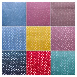 Könnte beinhalten: Neun Stoffmuster mit verschiedenen Hintergrundfarben und weißen Blumenmustern. Die Muster sind in einem 3x3-Raster angeordnet.