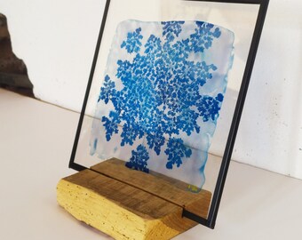 Cyanotype on glass “I get attached” with its wooden support