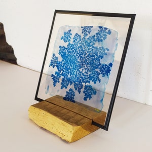 Cyanotype on glass “I get attached” with its wooden support