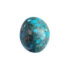 May include: A polished, oval gemstone displaying a mottled pattern of turquoise blue and grey-brown shades. The stone has a smooth, rounded surface, appearing to be a natural mineral specimen. The overall appearance is organic and earthy.