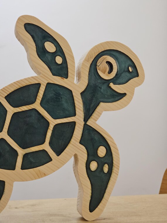 Close-up of sea turtle night lamp featuring green epoxy resin shell