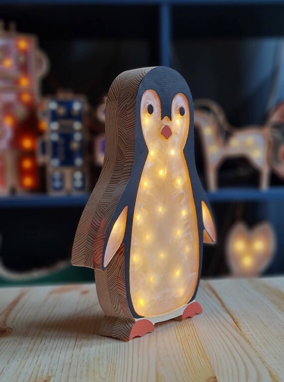 Cute penguin-shaped LED lamp perfect for kids' room decor