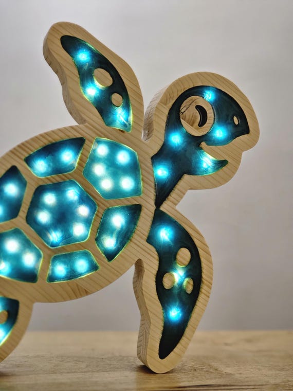Kids' room turtle night light with natural pine wood and epoxy details