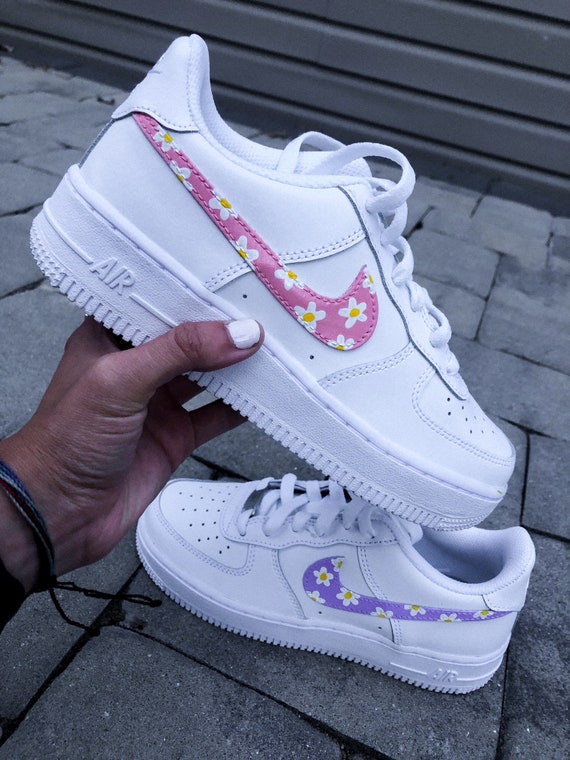 Pink floral nikes sales