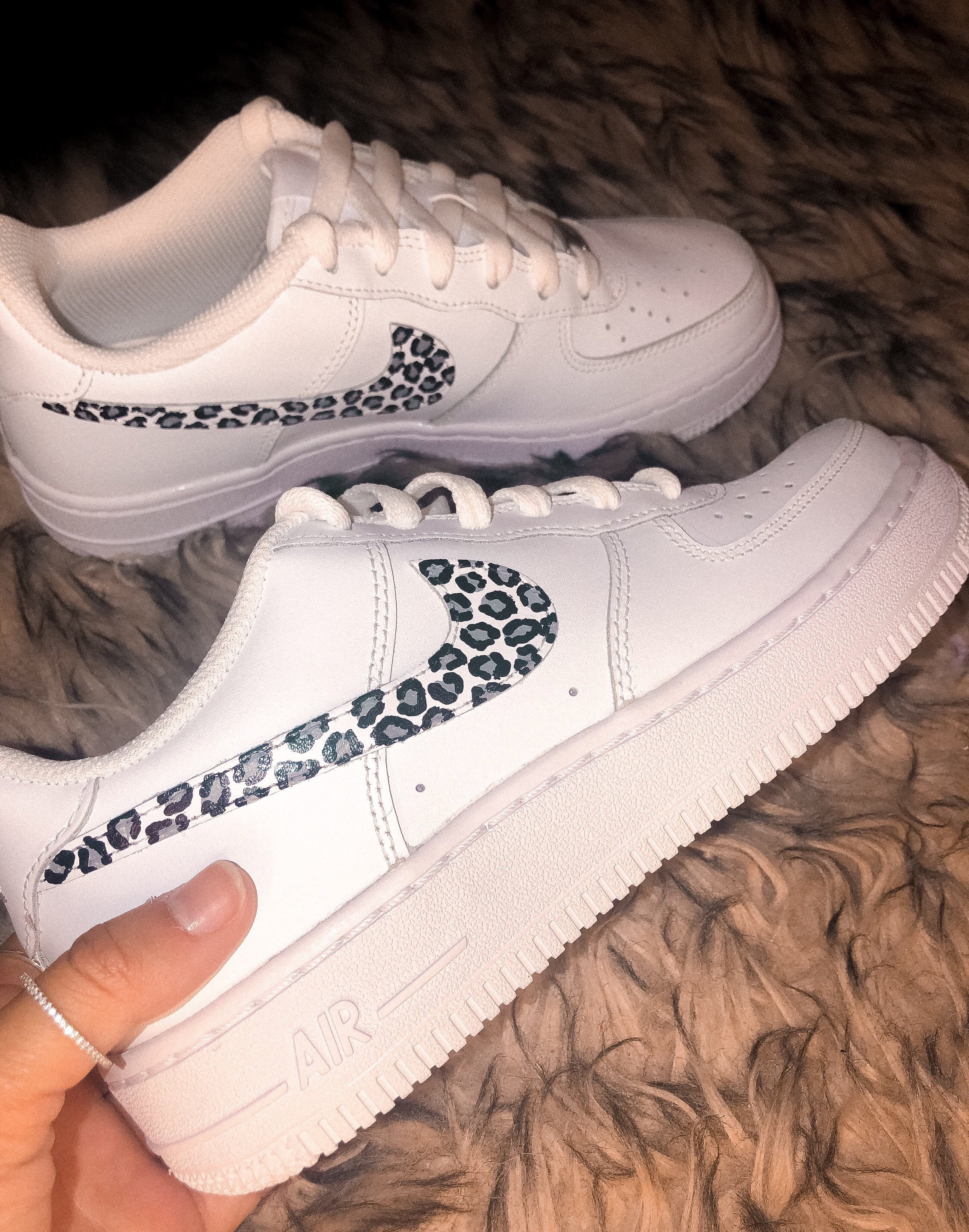 Black cheetah nikes 2025