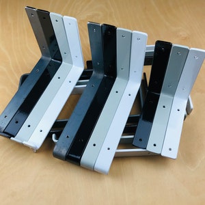 Scaffold board shelf bracket