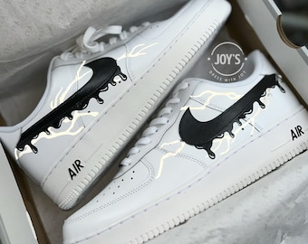 Custom Air Force 1 Sneakers with Reflective Lightning and Black Drip.
