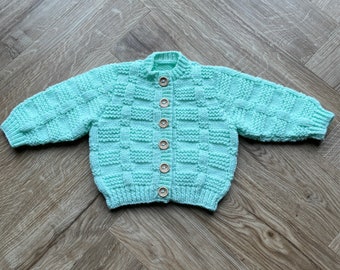 Hand knitted baby cardigan