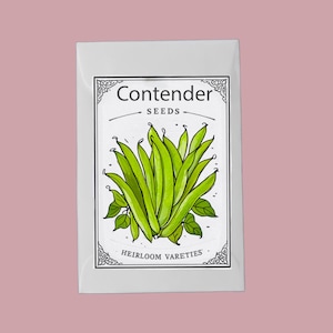 May include: A white ceramic mug with a black handle and the text "But First, Coffee" in a black, bold font. The mug is on a white surface.