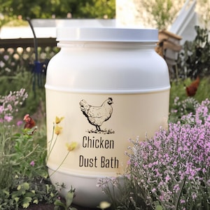May include: White plastic container with a yellow label that says "Chicken Dust Bath". A black and white illustration of a chicken is on the label.