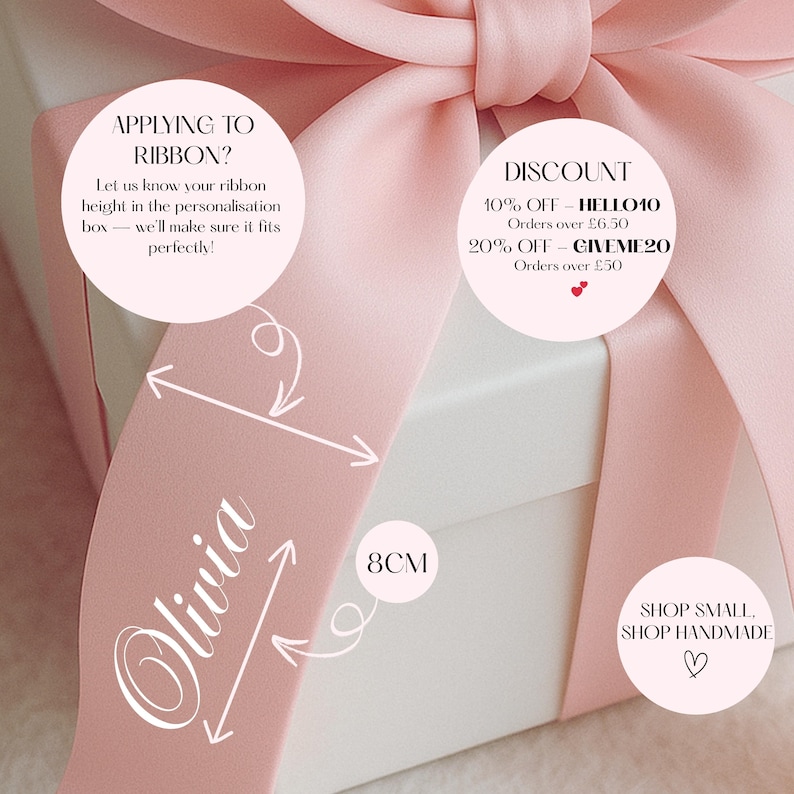 Iron on name decal on a Ribbon, wrapped around a white gift box. Including details of a discount code, the width and height and how is best to measure for a ribbon iron on decal.