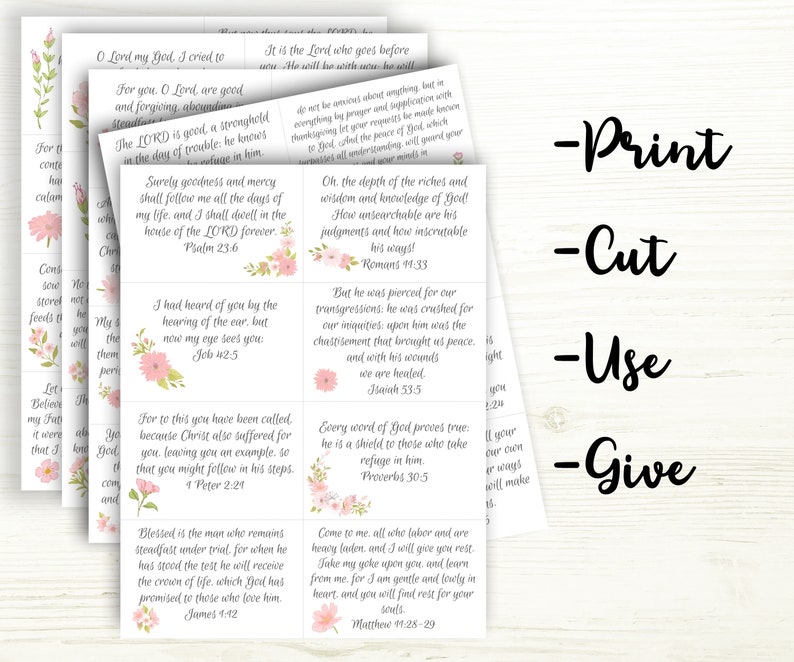 Stack of printable papers with scripture cards you cut out on each page.  Words next to papers say.  Print, Cut, Use, Give.  Cards have encouraging bible verses in a cursive gray script, with beautiful pink flowers on each car.