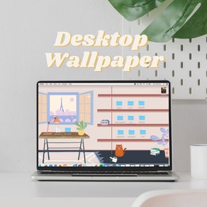 May include: A laptop computer with a white background and the text "Desktop Wallpaper" displayed on the screen. The wallpaper is a cartoon illustration of a room with a window, shelves, and a cat.