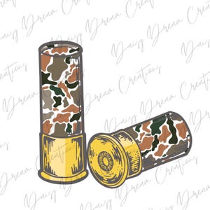 May include: Two shotgun shells with a camouflage pattern in shades of brown, green, and tan. The shell casings are gold-colored. One shell is upright, and the other is lying on its side.