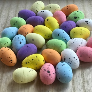 Speckled foam easter eggs for craft in assorted colors.