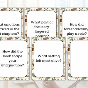 May include: Six reading comprehension cards with text prompts on a white background. The cards have a decorative border with a book and leaf design. The prompts include questions about emotions, story elements, and imagination.