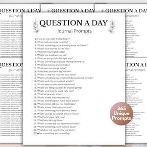 May include: White paper journal prompts with the text "QUESTION A DAY" and "365 Unique Prompts". The journal prompts are for self-reflection and include questions about feelings, habits, and daily experiences.