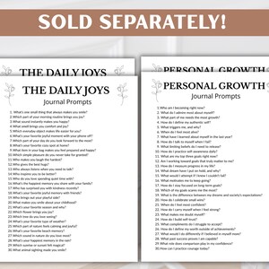 Puede incluir: Dos hojas de indicaciones para diarios, "The Daily Joys" y "Personal Growth", con detalles florales. Cada hoja presenta una lista de preguntas dise&ntilde;adas para la autorreflexi&oacute;n y la escritura en un diario. El texto "SOLD SEPARATELY!" est&aacute; en la parte superior.