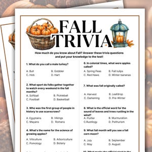May include: A Fall Trivia game sheet with a basket of pumpkins and a lantern illustration. The title "FALL TRIVIA" is in large, bold letters. The sheet includes trivia questions about fall, with multiple-choice answers.