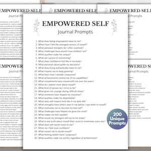 May include: A set of white paper sheets featuring the title EMPOWERED SELF Journal Prompts in black text, decorated with small floral line art illustrations. The pages contain numbered lists of reflective questions and a circular badge stating 200 Unique Prompts.