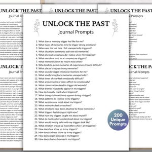 May include: A set of white paper sheets featuring the black printed title UNLOCK THE PAST Journal Prompts, decorated with small floral line art. The central page displays a numbered list of thirty questions, with a blue circular badge stating 200 Unique Prompts.