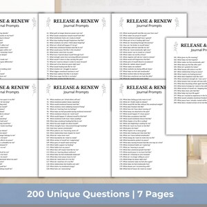 May include: White journal prompt pages with the text "Release & Renew Journal Prompts". The image shows seven pages with 200 unique questions. The pages are arranged on a light wooden surface.