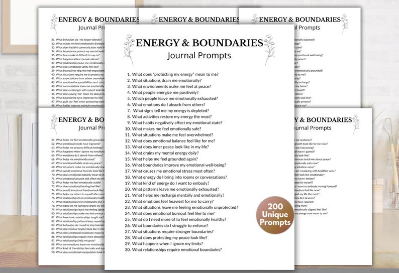 May include: A stack of white paper sheets with the text "ENERGY & BOUNDARIES Journal Prompts" and a list of questions. A brown circular sticker with the text "200 Unique Prompts" is also visible.