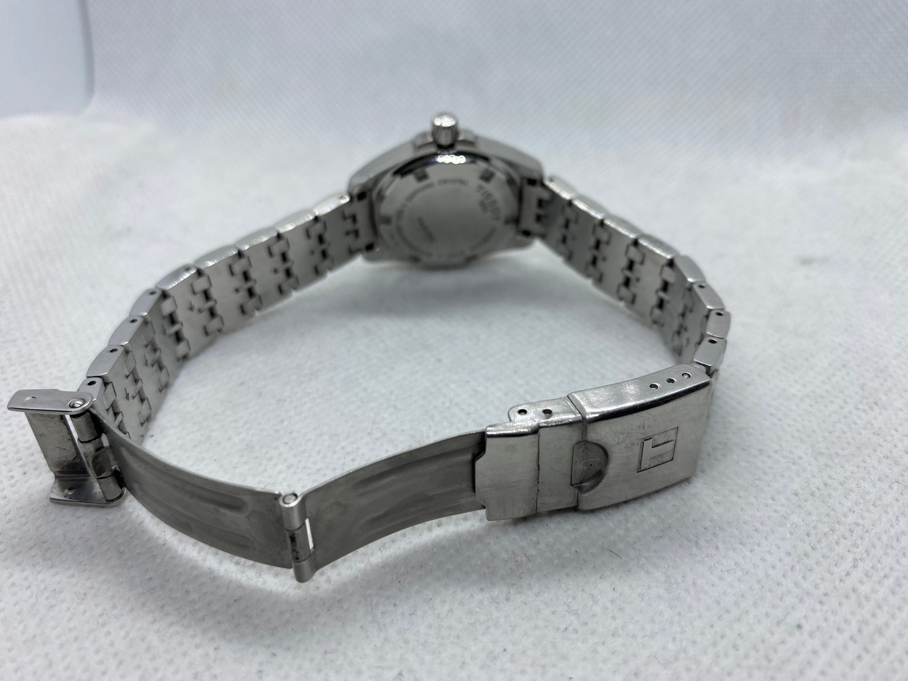 Tissot womens silver watch with blue face Etsy
