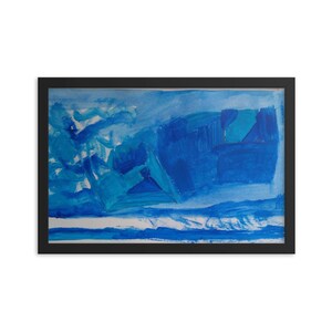 May include: Abstract art print in a black frame. The artwork features a blue and white color palette with brushstrokes creating a landscape-like composition. The painting has a textured appearance, with varying shades of blue.